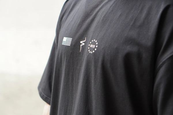 Black t-shirt with No Straight Path® logos on a plain background