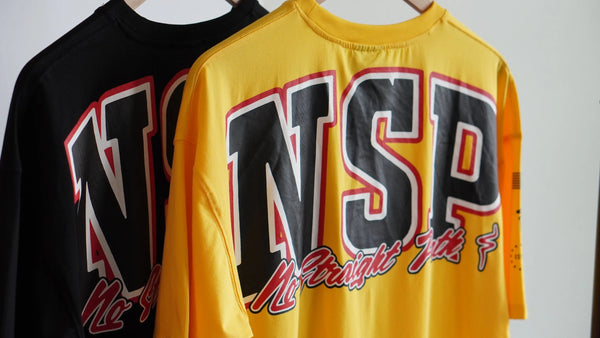 Black and yellow tee shirts with 'NSP' branding on a white background