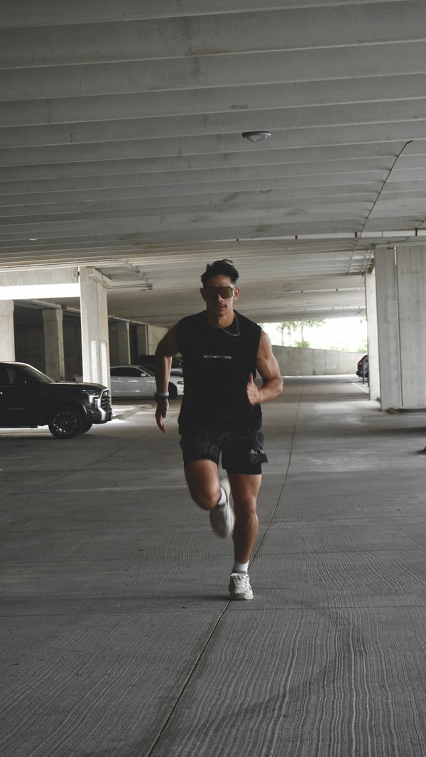 Person running in a parking garage