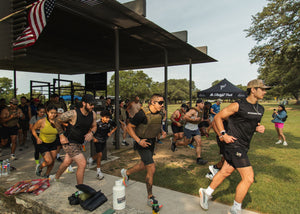 Runners taking off for the start of an event