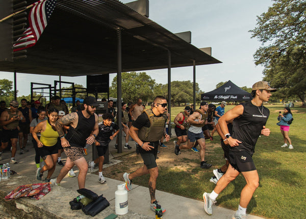 Runners taking off for the start of an event