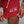 Red shorts with 'No Limits. No Excuses. ALL IN.' text on a neutral background