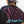 Woman wearing a black t-shirt with a pink and blue No Straight Path® logo on the back.