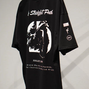 Black t-shirt with white graphic design on a hanger against a gray background