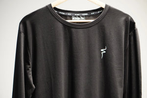 Black long-sleeve shirt with a white No Straight Path® logo on a hanger against a light gray background