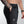 Person wearing black athletic pants with a No Straight Path® logo on a white background