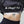 Person wearing a black crop top with 'No Straight Path' text, white underwear, and black pants.