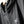 Black jacket with a white No Straight Path® logo on a blurred background
